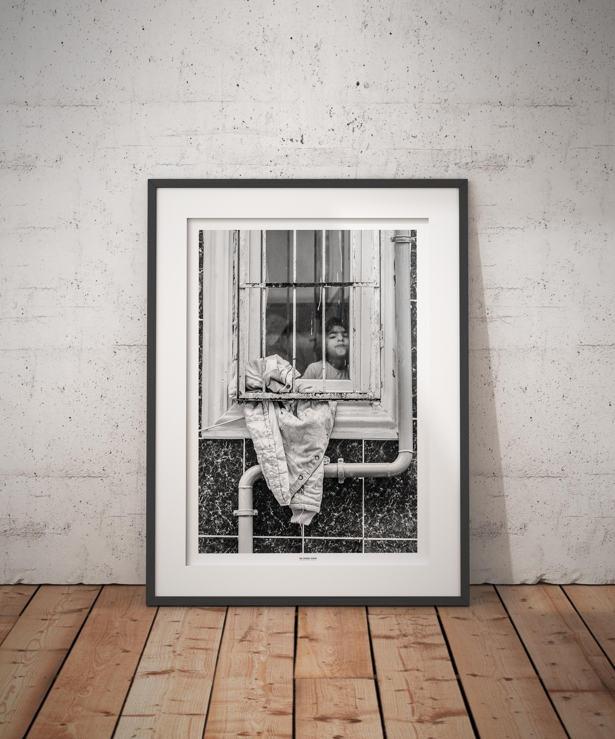 The Turkey Series - A Syrian girl in a window in Al Fatih, Istanbul. Photo by photographer Martin Thaulow. Open Edition (seen in a frame in an environment. The frame is not part of sale). Buy high quality print.